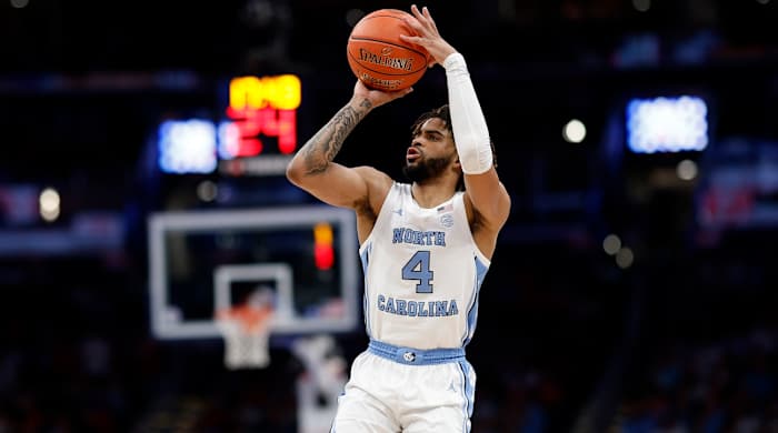 North Carolina Tar Heels guard RJ Davis (4) shoots the ball against the North Carolina State Wolfpack during the second half at Capital One Arena in Washington, D.C., on March 16, 2024.